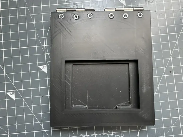 PCB and stencil seated in the YGN Stencil Holder jig