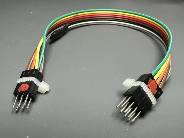 Eight-wire clip bundle with two insulated ends and six wires zip-tied at both ends